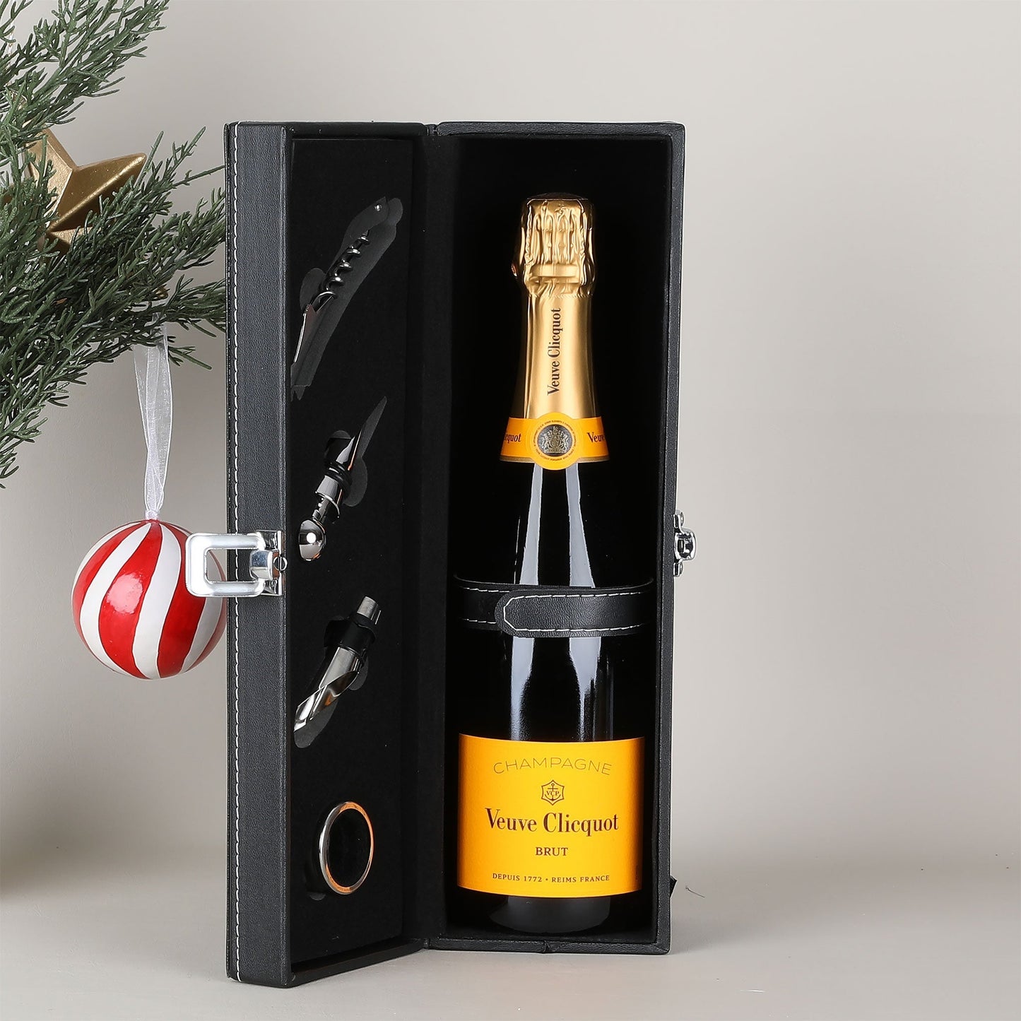 Veuve Clicquot champagne bottle in a black gift box.