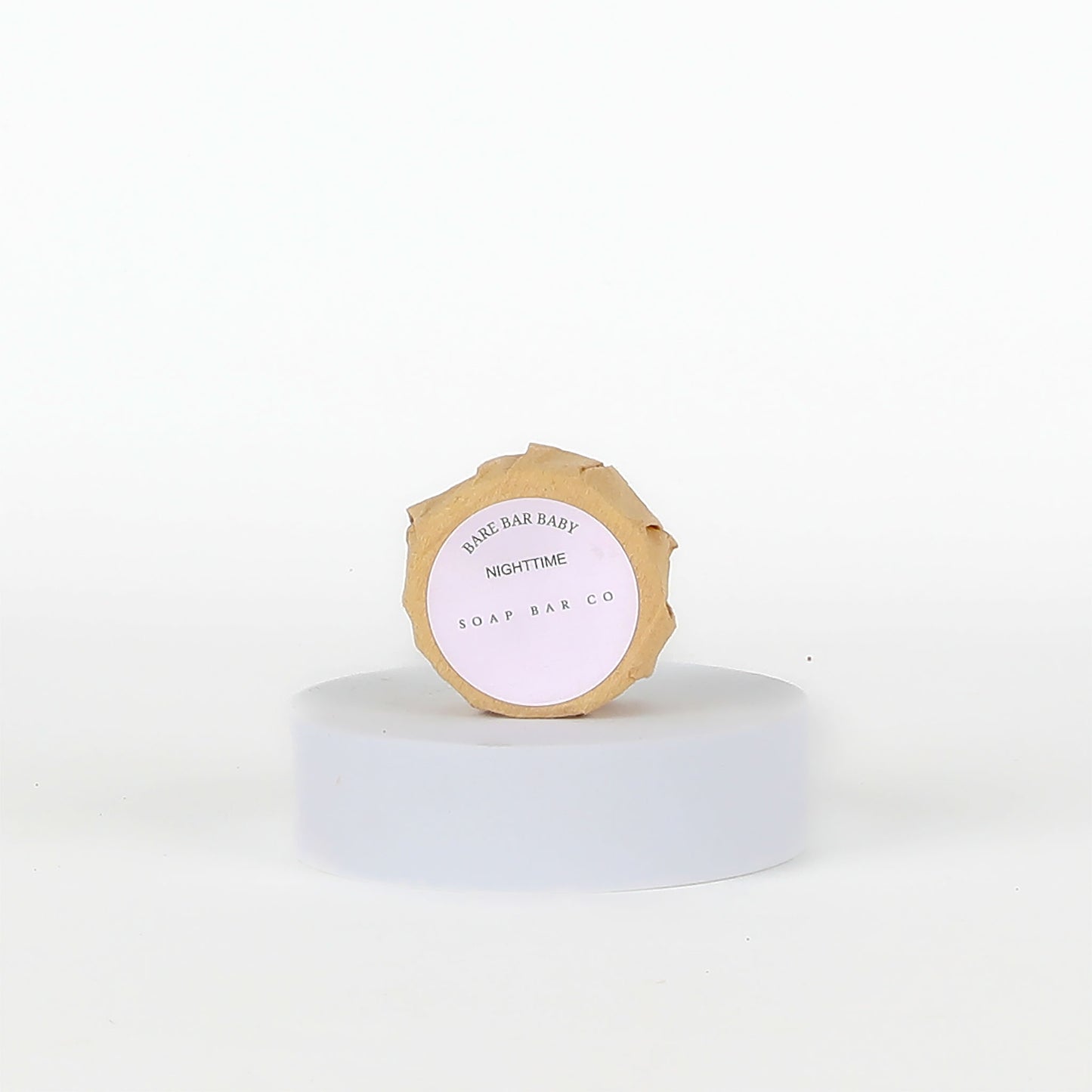 Wrapped soap bar with label on a white background