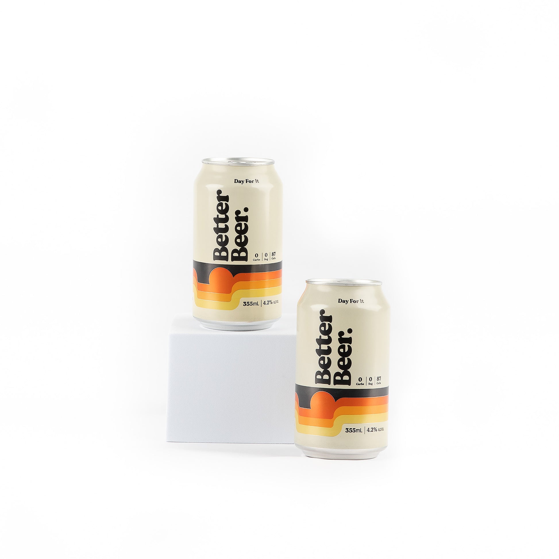 Two cans of beer on a white background