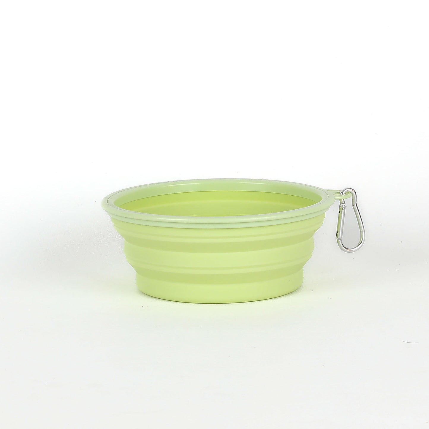 Green silicone bowl with a carabiner on a white background