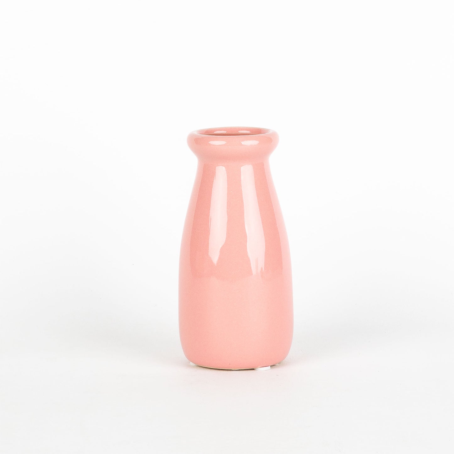 Pink ceramic vase on a white background