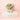 Bouquet of chocolate flowers with a white ribbon and large hamper box