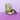 Body scrub packaging, bowl of scrub, and jar on a purple surface with a light purple background