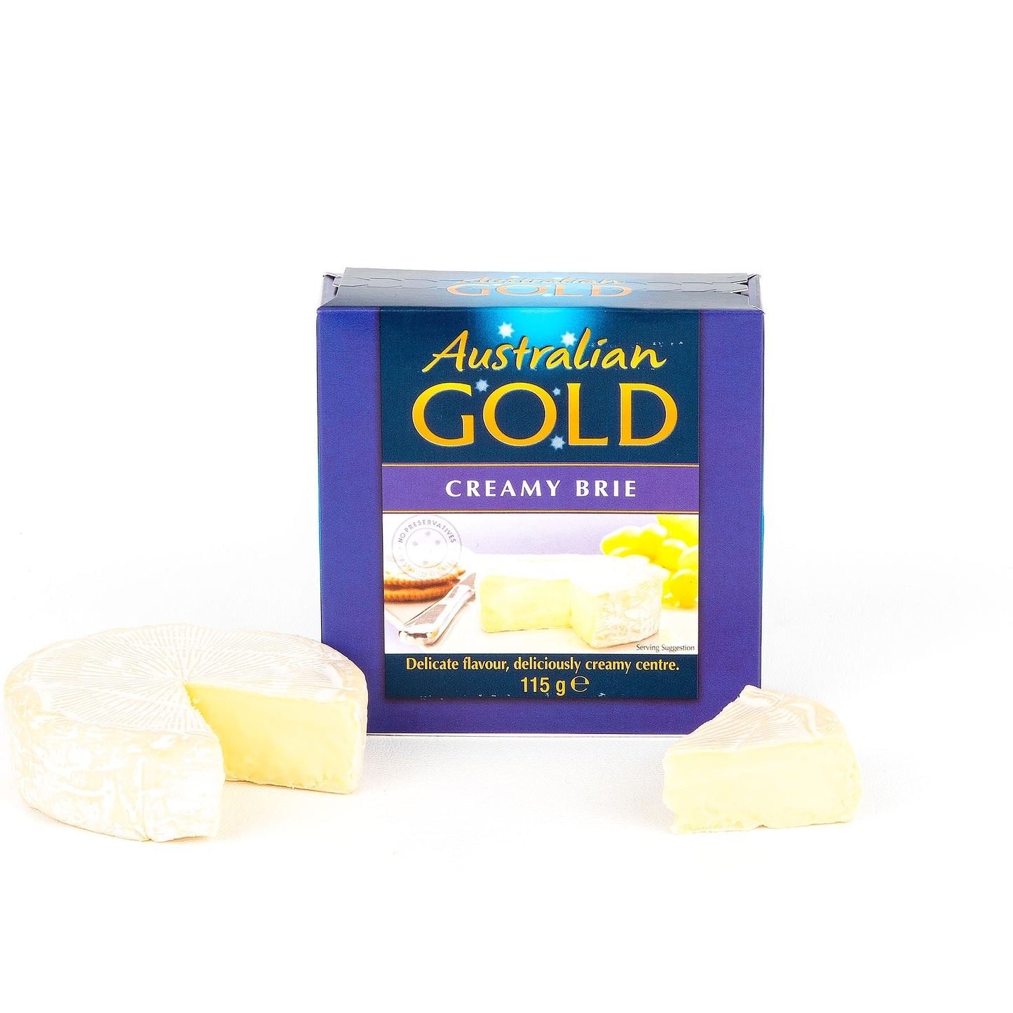 Australian Gold Creamy Brie packaging with cut cheese in front of it on a white background