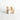 Pair of beige knitted baby booties on a white background