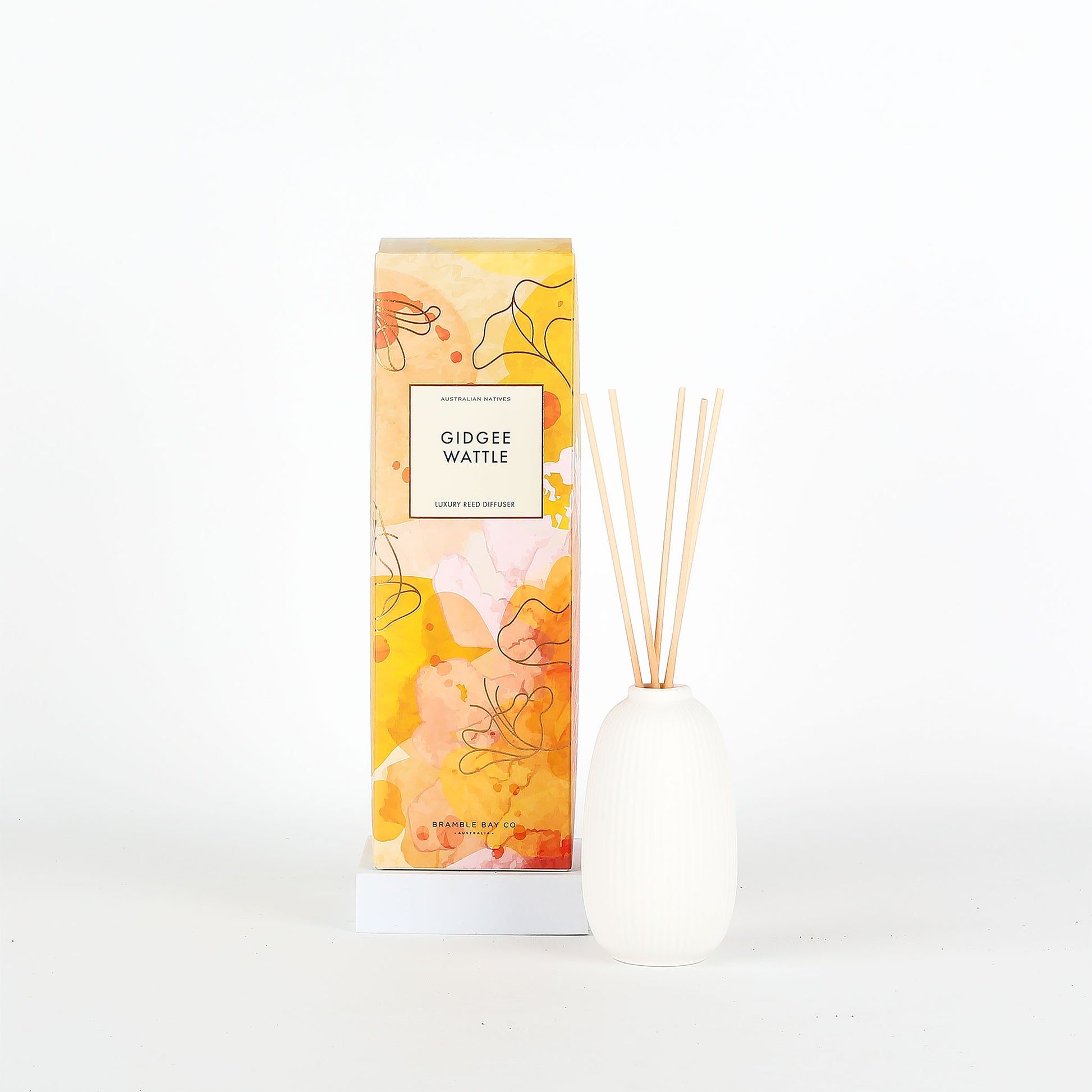 Diffuser with floral packaging on a white background