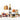 Assorted food items including wine, nuts, spreads & cheese board on a white background