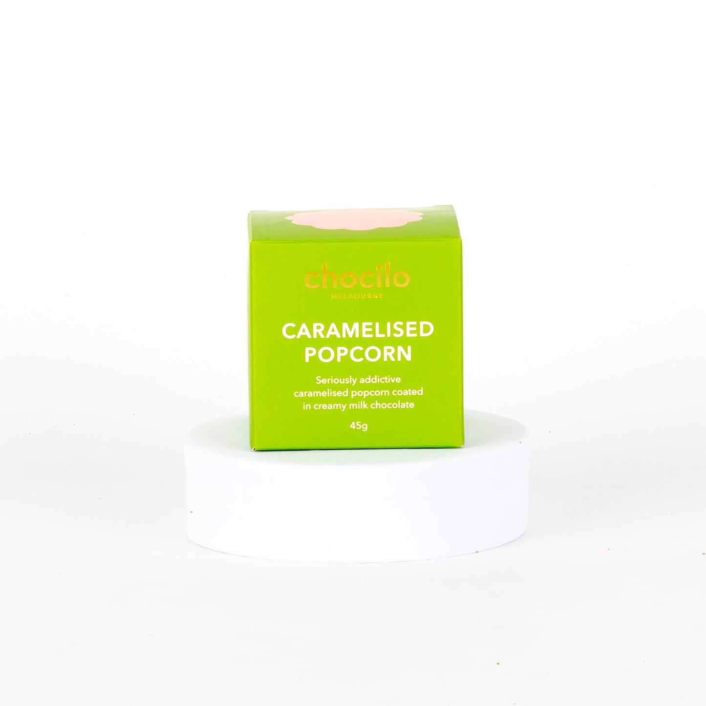 Green box of Chocilo caramelised popcorn on a white background