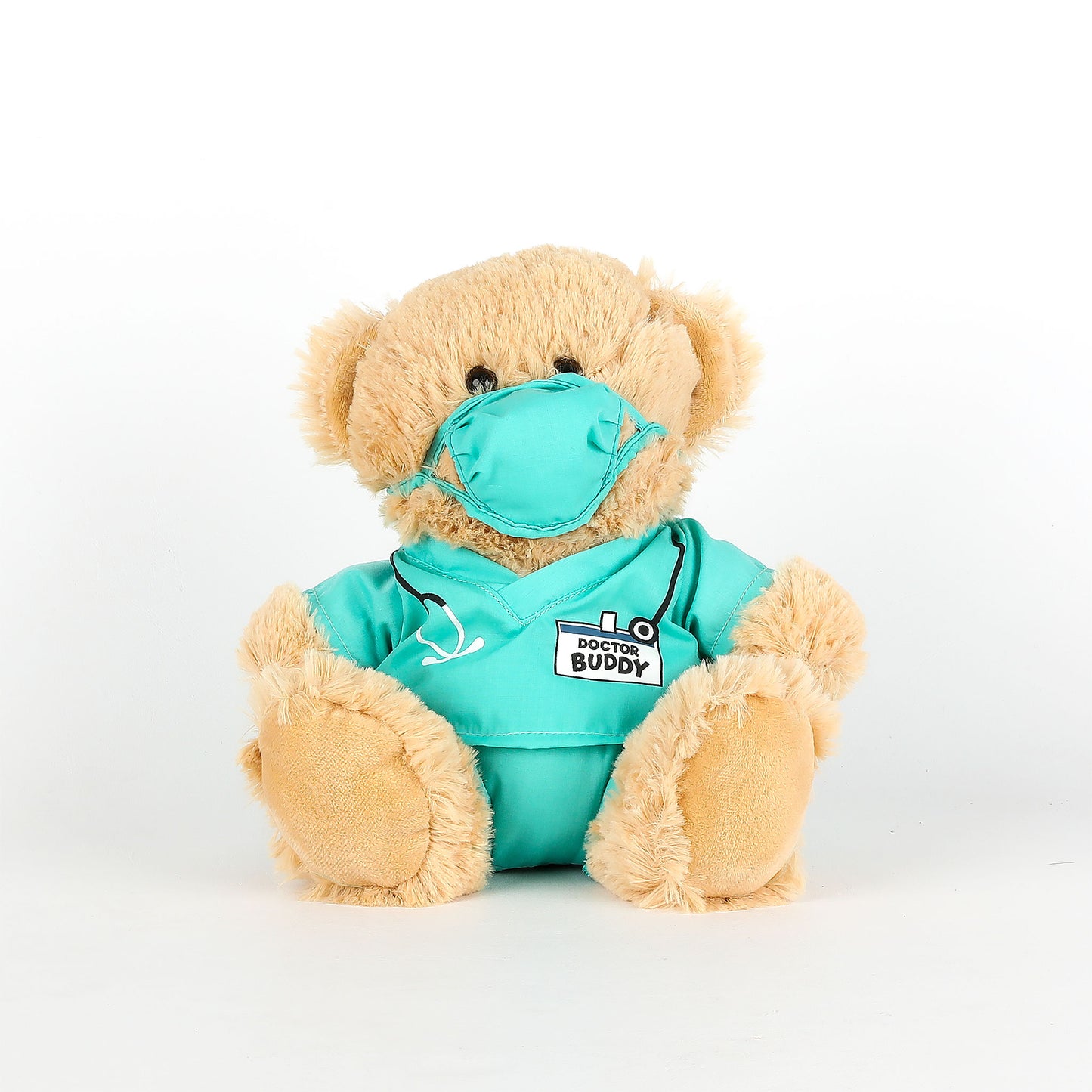Teddy bear in a turquoise medical outfit with a mask on a white background