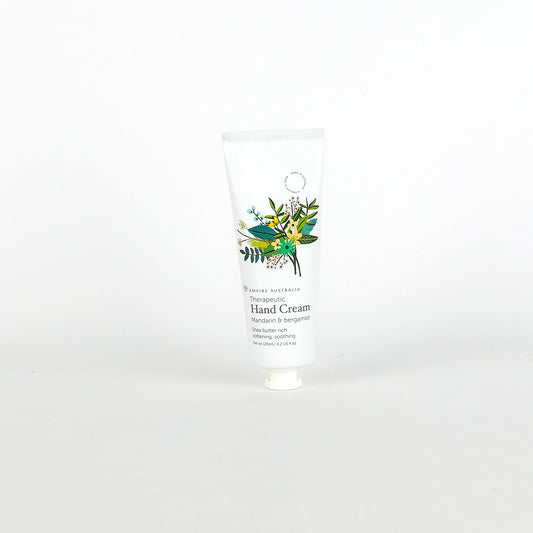 Hand cream with a floral label on a white background
