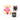 Teddy bear in pink scrubs with a mask and MOR candle on a white background