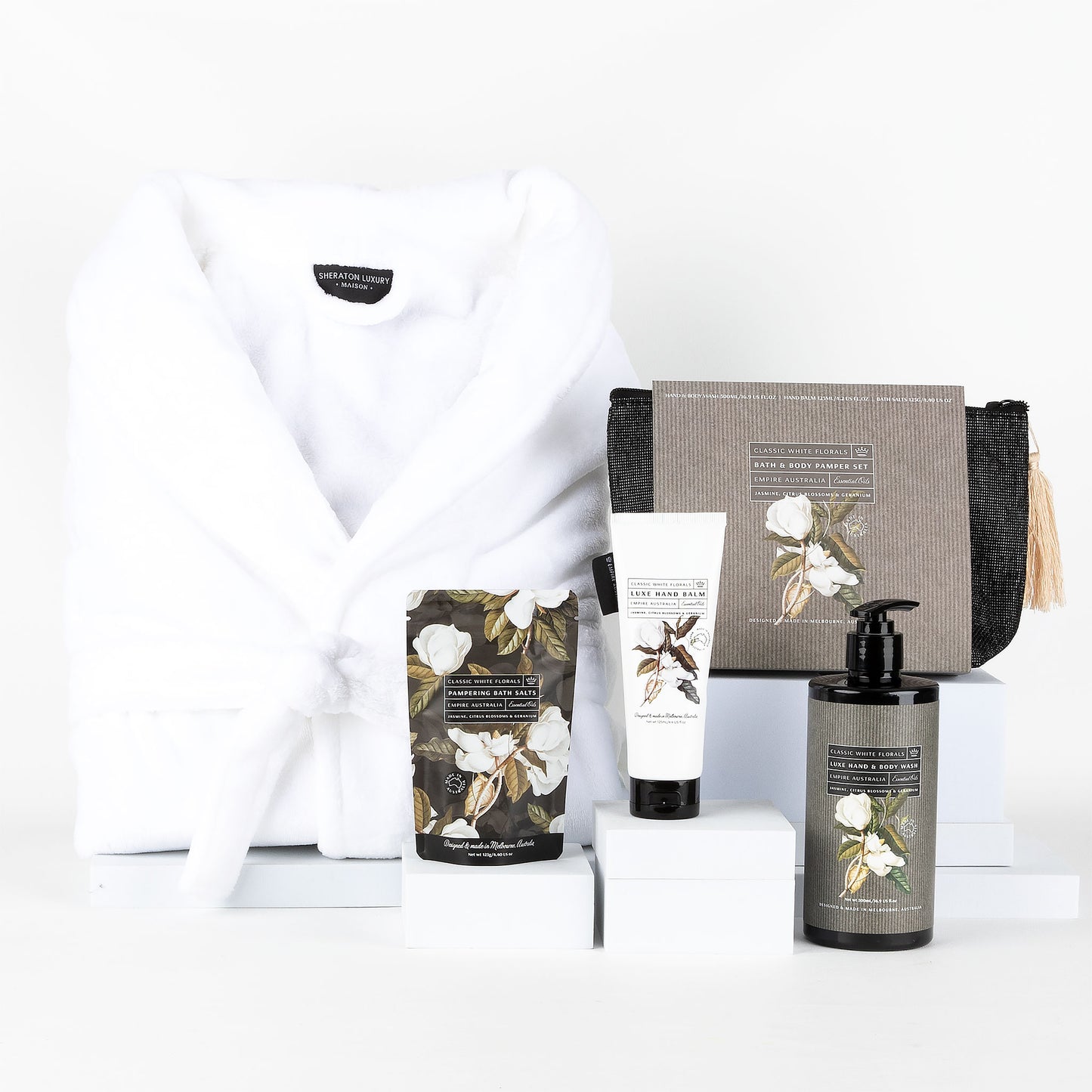 White robe & pamper products on a white background