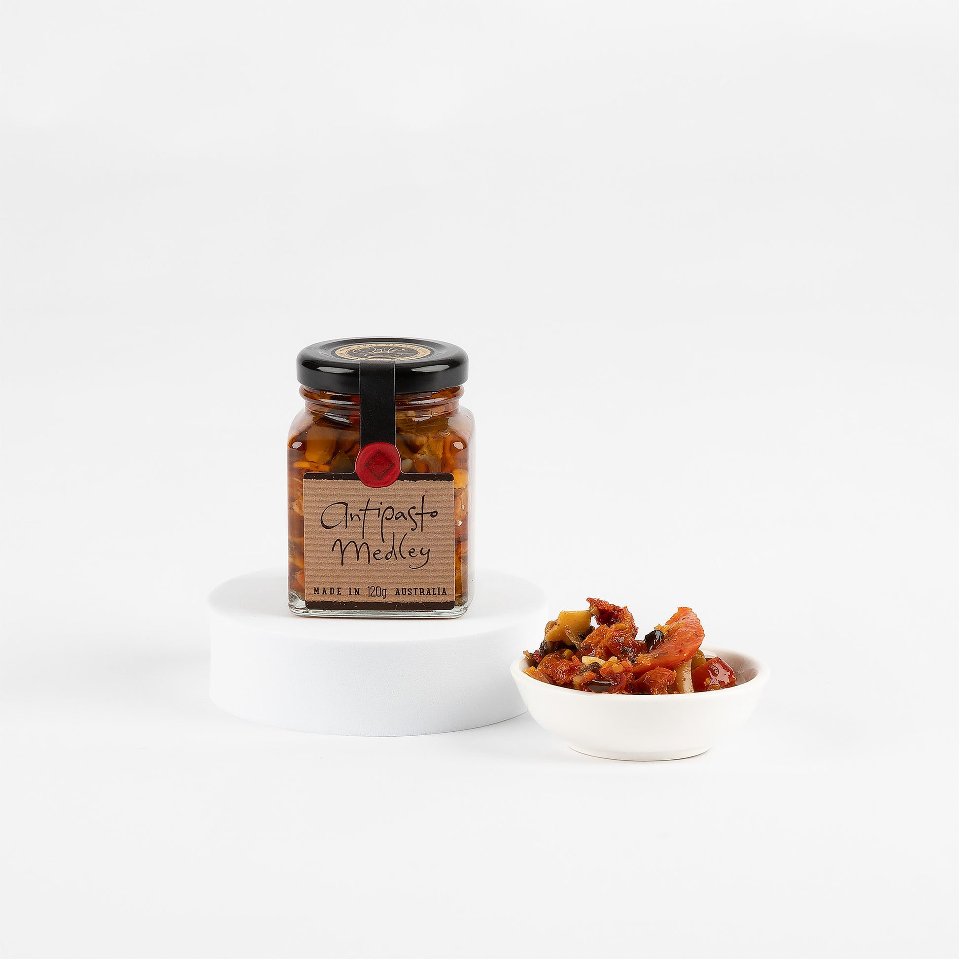 Jar of Antipasto Medley on a white background