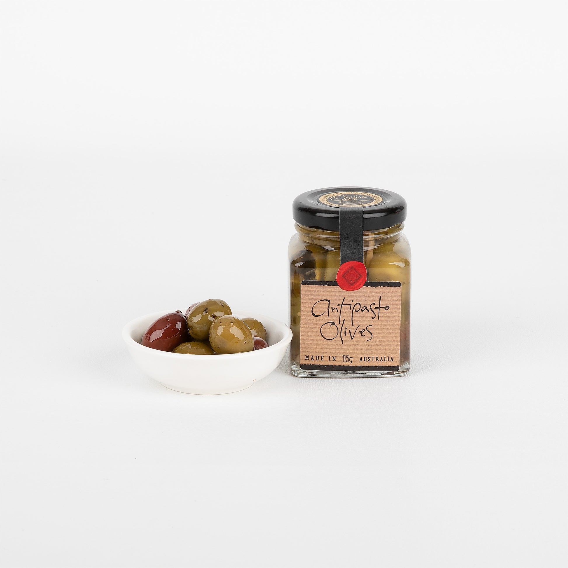 Jar of olives on a white background