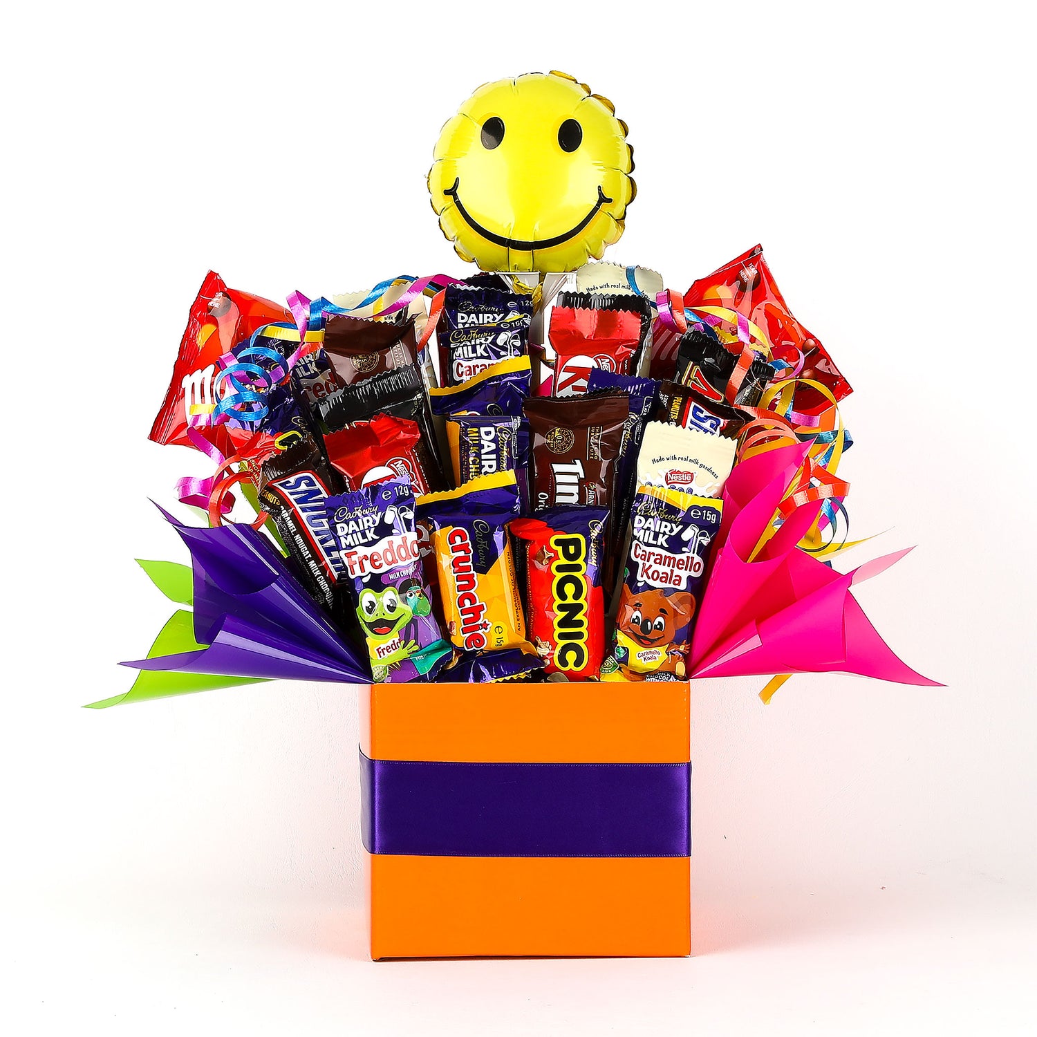 Chocolate bouquet with a smiley face balloon on a white background