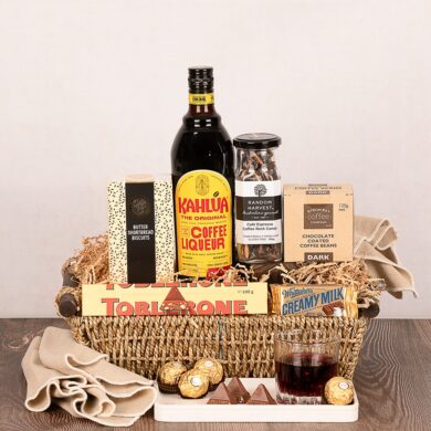 Wicker gift basket including Kahlua coffee liqueur and a range of sweet coffee flavoured snacks.