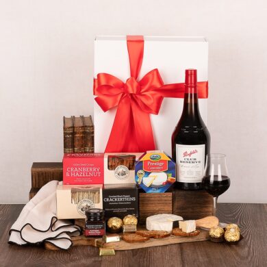 White hamper box with Penfolds Club Reserve Tawny and a selection of savoury gourmet nibbles.